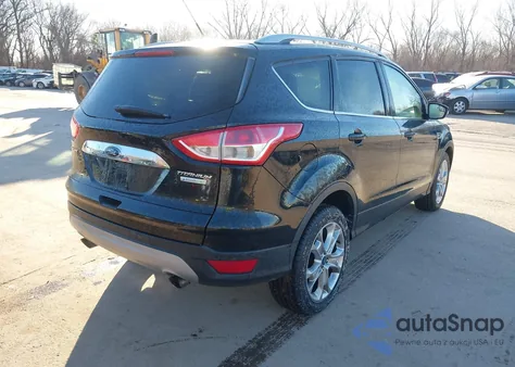 2015 Ford Escape Titanium z USA, uszkodzony, nr VIN 1FMCU0J90FUA20356